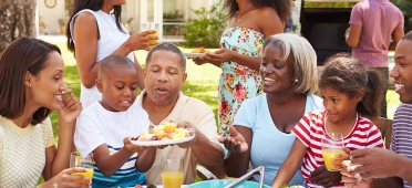 Family having outdoor bbq